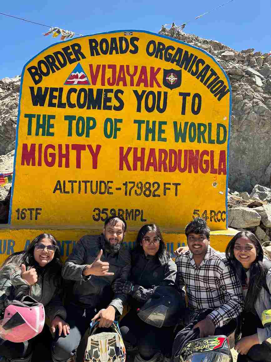 Group of riders on a Khardung La bike ride enjoying Himalayan view