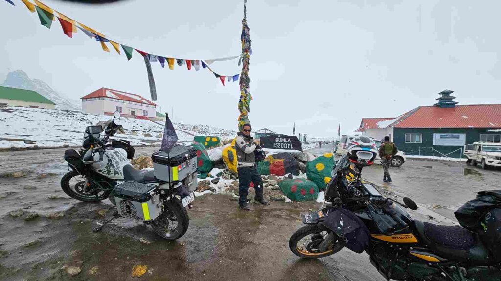 Tawang bike trip group at Bum La Pass on the Indo-China border