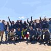 Group of bikers at Nubra Valley sand dunes during June bike trip in Ladakh