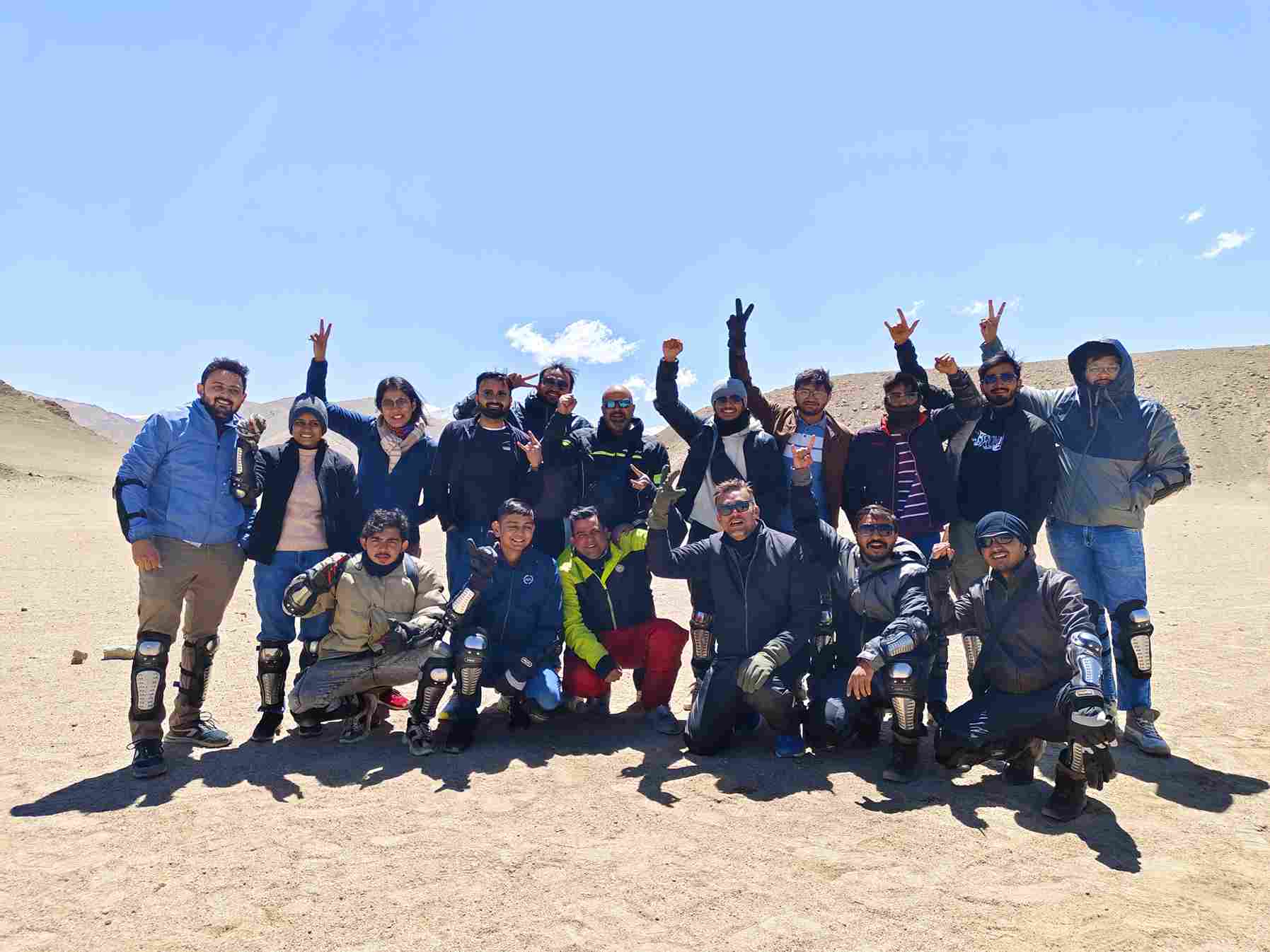 Biker riding towards Leh on a scenic Himalayan road during Delhi to Leh bike trip